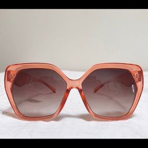 Pink 70’s inspired sunglasses from Anthropologie